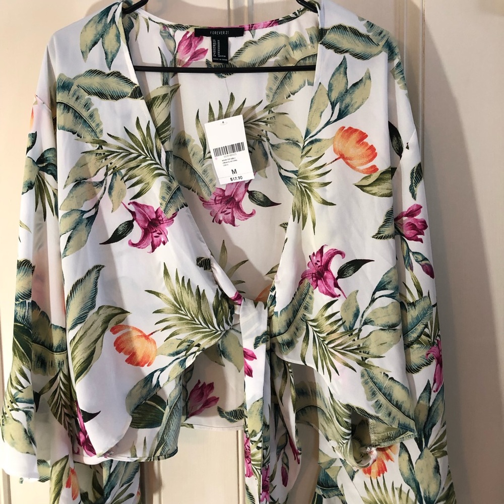 Over-shirt or bathing suit cover w/ flower print.